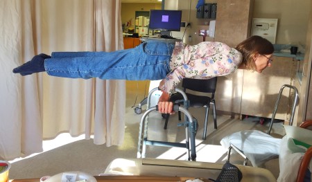 Julie showing us how to use a walker